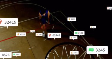 Basketball player dribbling key before activating analytics icons and executing layup scoring. Sports, competition, performance, athleticism, energy, minimalism, digital