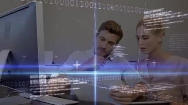 Data processing and blue light trails against caucasian couple calculating finance. family budget and global networking technology concept