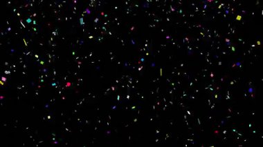 Siyah arkaplandan düşen konfeti animasyonu. Noel geleneği ve kutlama konsepti dijital olarak oluşturulmuş video.