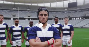 Rugby takımı saha kaptanına karşı diziliyor. Dijital baloncuklar kümeleniyor. Sporcular, takım çalışması, sportmenlik, profesyonellik, rekabetçi, fiziksel, dinamik