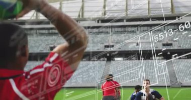 Red-jerseyed rugby player throwing line-out with stats overlay navy-and-white jumper securing ball. Athletics, teamwork, strategy, outdoor, competition, motion, accuracy