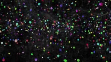 Siyah arkaplanda renkli noktaların ve bağlantıların animasyonu. şekil, bağlantılar, renk ve hareket konsepti dijital olarak oluşturulmuş video.