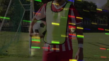 Teknik demo 'da dijital çubukları bozuk olan futbolcuyu kale tutarken kamerayı yakınlaştırmak. Atletik, rekabetçi, hareketli, dijital, gelecekçi, spor, enerjik