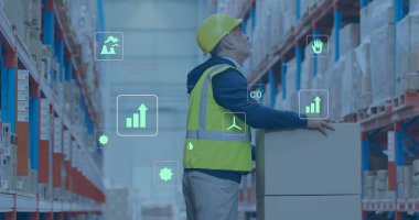 Warehouse worker wearing helmet hi-vis vest placing box in warehouse with digital icons, copy space. Industrial, logistics, technology, efficiency, safety, sustainability, data