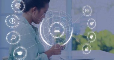 Holding smartphone, Asian woman navigating holographic interface in office, with laptop, copy space. Technology, innovation, futuristic, digital, workspace, professional, sustainable