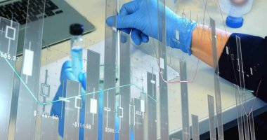 Nitrile-gloved hands pipetting liquid into graduated cylinder at lab station with financial overlay. Scientific, analytical, precision, innovation, modern, research, technology