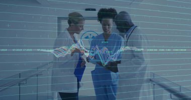 Medical team in scrubs and coats discussing data overlays in hospital corridor, with digital tablet. Clinical, healthcare, teamwork, technology, diagnosis, professionalism, innovation