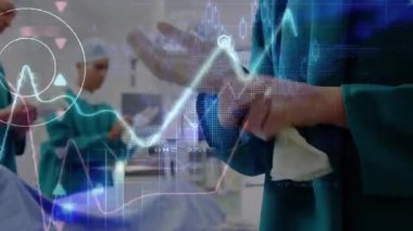 Baş cerrah ameliyattan önce hayati bulguları ön plana çıkardıktan sonra steril eldiveni çekiyor. Tıbbi, yenilik, teknoloji, kesinlik, takım çalışması, sağlık hizmetleri, dijital