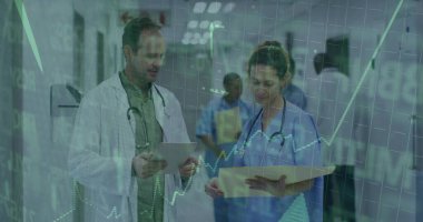 Walking male doctor holding tablet and nurse reading file in hospital corridor with data overlay. Clinical teamwork, healthcare professionals, hospital environment, medical collaboration, data visualization, patient care, professional communication