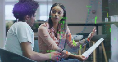 Business colleagues discussing financial data on tablet in office lounge, with candlestick overlays. Corporate, collaboration, analytics, technology, professional, workspace, modern