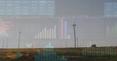 Hava kararınca rüzgâr çiftliği açılıyor, pervaneler dönüyor, veriler enerji eğilimlerini örtüyor. Yenilenebilir, sürdürülebilirlik, analitik, teknoloji, çevre, çevre dostu, veri görselleştirme