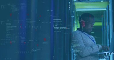 Tech diagnosing in data center aisle, with laptop, network cables and LED lit racks, copy space. Technology, infrastructure, digital, maintenance, cybersecurity, innovation, industrial