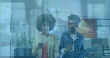 Walking colleagues carrying smartphone, coffee cup, blue folder in office hall, with digital charts. Business, teamwork, innovation, technology, contemporary, collaboration, productivity