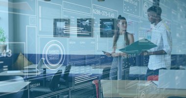 Discussing two coworkers analyzing AR data interface in modern office, with laptop and tablet. Technology, innovation, collaboration, digital, futuristic, productivity, workplace