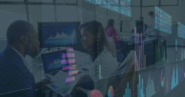 Discussing man in suit and woman in blouse analyzing charts on laptop at office, data overlays. Collaboration, analytics, modern, creative, workspace, insights, teamwork