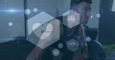 Spor salonunda egzersiz yapan beyaz adamın sağlık ve sağlık ikonlarının animasyonu. aktif sağlıklı yaşam tarzı ve spor konsepti dijital olarak oluşturulmuş video.