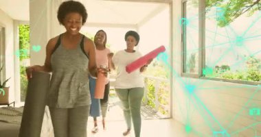 Üç kadın odaya ellerinde paspaslarla giriyor ve kollarını açıp yoga seansına hazırlanıyorlar. Fitness, sağlık, rahatlama, doğal ışık, yoldaşlık, açık hava, motivasyon