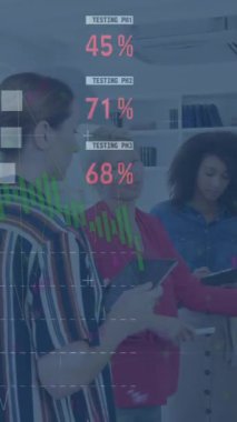 Animation of financial data processing over diverse business people working in office. Global business, finances, computing and data processing concept digitally generated video.