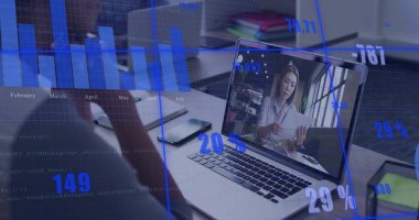 Showing man joining online meeting at office desk, listening with paperwork and analytics overlay. Professional, collaboration, technology, analytics, workspace, digital, business