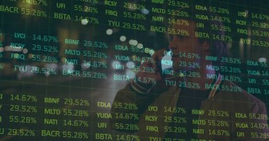 Holding smartphone trader peering through digital stock ticker at glass lobby, with bokeh lights. Technology, finance, urban, business, innovation, connectivity, modern