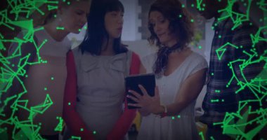 Team collaborating by swiping tablet screen and revealing pulsing green network overlay in business. Collaboration, teamwork, innovation, digital, connectivity, synergy, modern
