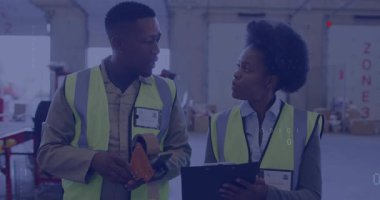 Warehouse workers taping boxes and updating stock in Zone 3, binary code overlays drifting. Industrial, logistics, digital, technology, teamwork, organizational, collaborative