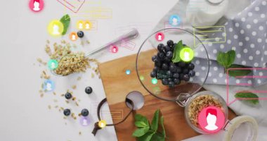 Icons and chat bubbles appearing, swirling then dispersing over cutting board to show interaction. Health, nutrition, breakfast, organic, lifestyle, digital, communication