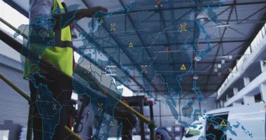 Warehouse operator tapping palm manipulating logistics map highlighting nodes tracing global routes. Technology, innovation, logistics, supplychain, data visualization, digitalinterface, industrial