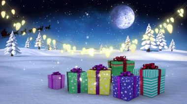 Animation of falling snow over christmas gift winter scenery. christmas, winter, tradition and celebration concept digitally generated video.