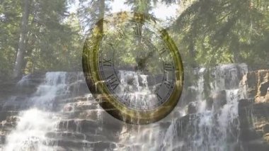 Sunlight hitting pocket watch rotating with minute hand moving above waterfall to show time passing. Nature, serenity, timeless, reflection, tranquility, enchantment, vintage
