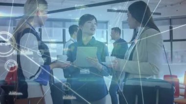 Three business colleagues in break area, center woman tapping tablet and animating data network. Collaboration, innovation, networking, technology, professional, workspace, communication