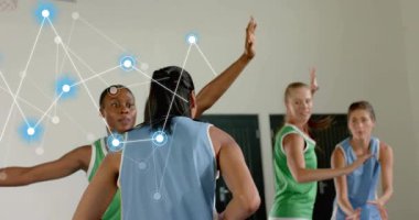 Athlete pivoting at free-throw line and shooting basketball for scoring with data overlay tracking. Sports, competition, motion analysis, digital technology, team dynamics, athleticism, performance