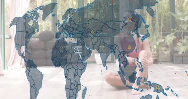 Yoga instructor hugging knee and initiating world map data visual for wellness insight. Mindfulness, connection, global, digital, contemplation, harmony, serenity