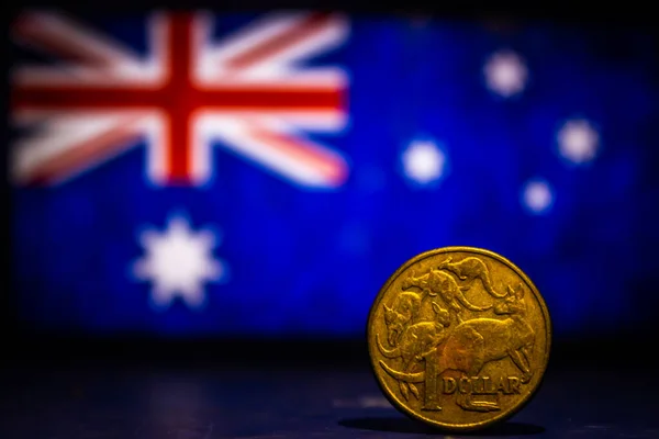 Australian dollar coin isolated on Australia flag background with space for copy text. One dollar coin 1995 Australian currency. Old coins collection world wide.
