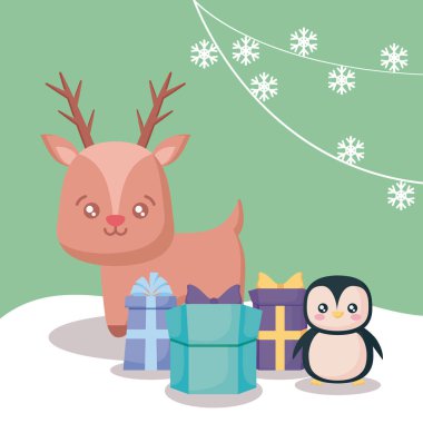 Ren geyiği ile penguen ve Hediyelik Noel kutuları