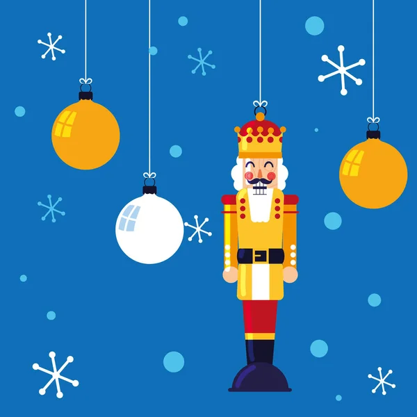น็อตแครกเกอร์ของเล่นคิงแขวนกับลูกบอลของคริสต์มาส — ภาพเวกเตอร์สต็อก