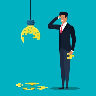 Şekil ampul puzzle parçaları ile işadamı