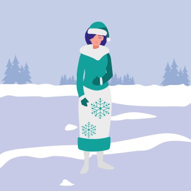 Kışlık elbiseli genç kadın.