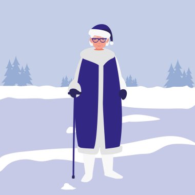 baston ve kış giysileri ile sevimli Büyükanne