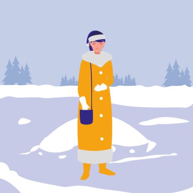 Kışlık elbiseli genç kadın.