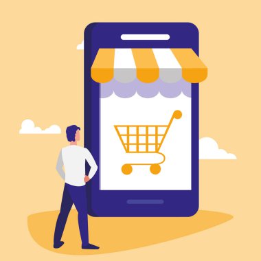 alışveriş sepeti ile akıllı telefon kullanan genç adam