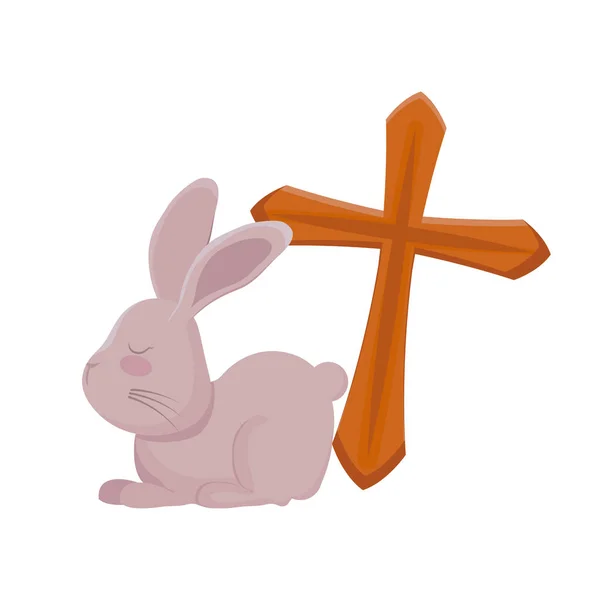 Lindo conejo con cruz católica de madera — Vector de stock