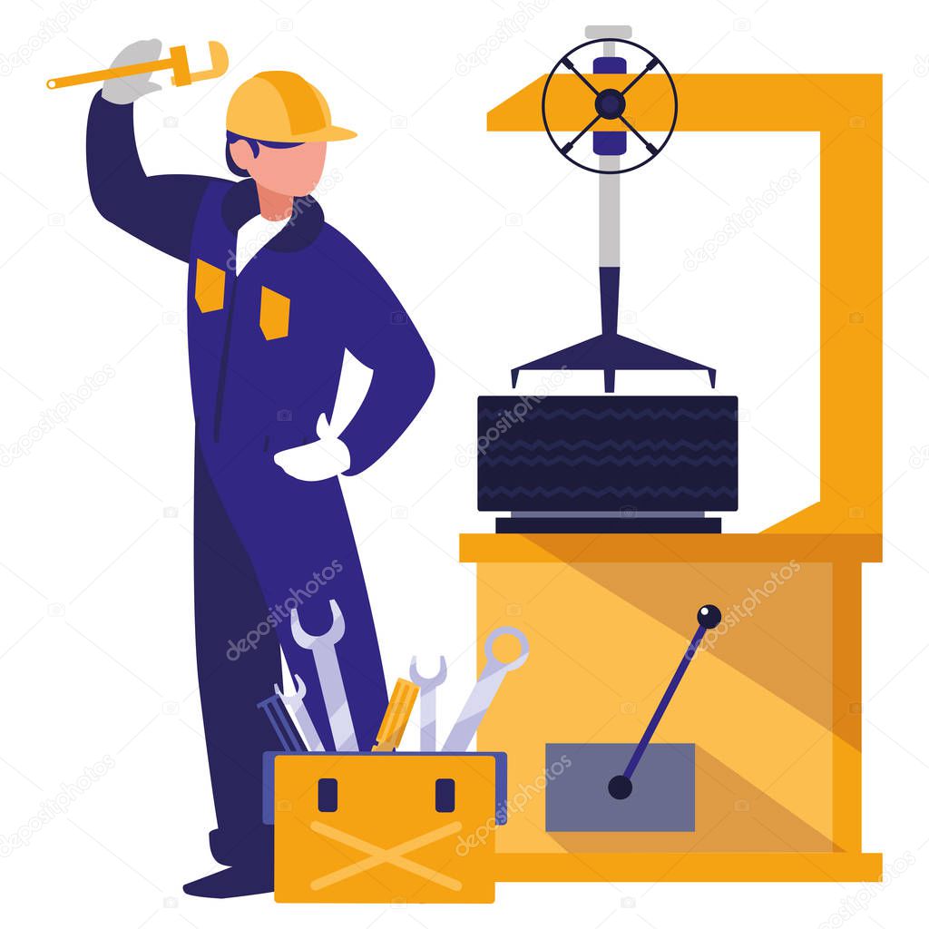 mechanic worker with tire changer machine