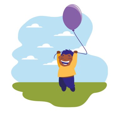 Mutlu çocuk balon tutuyor.