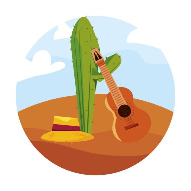 çölde kaktüs ve gitar hasır şapka