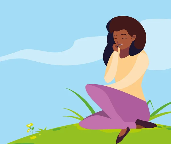 Schöne schwarze Frau sitzt im Park — Stockvektor