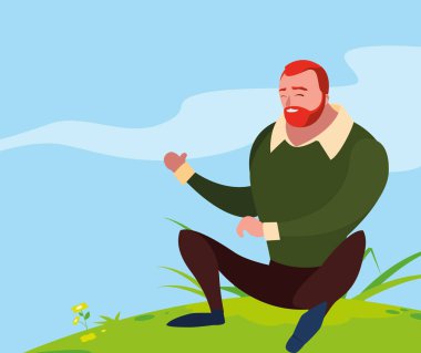 alanında oturan güçlü ve sakallı adam