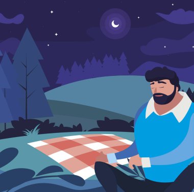 adam alan piknik günü oturmuş