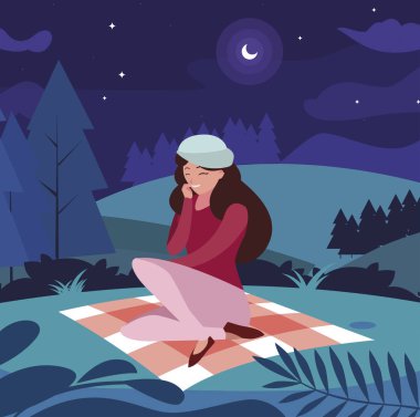 parkta piknik gününde oturan bere ile güzel kadın