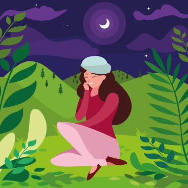 Gece tarlada oturan bereli bir kadın.